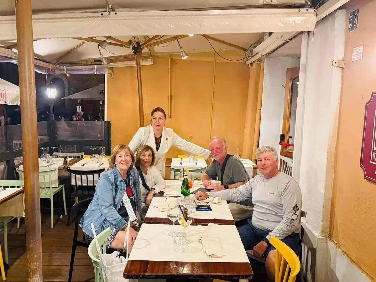 Small group having dinner in central Italy