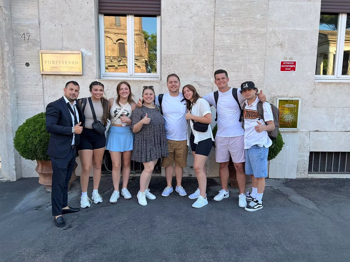 Family group photo during a city walk in Italy