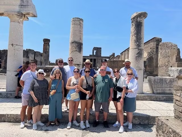 Group tour at ancient Roman ruins in Italy