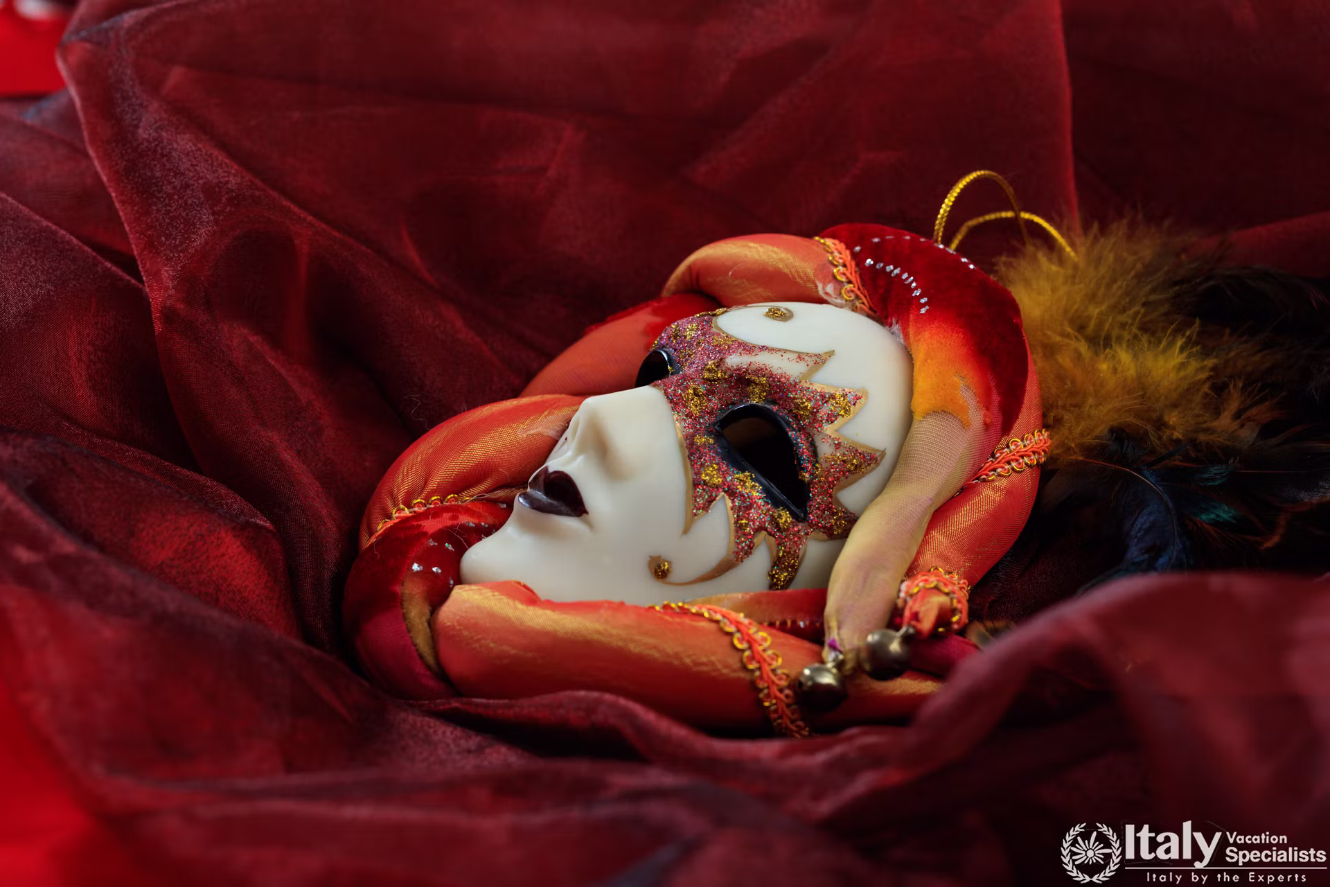 Dramatic Mask on Red Fabric Background Still Life 2026 09 22 23 12 59 Utc, Murano, Venetian Lagoon