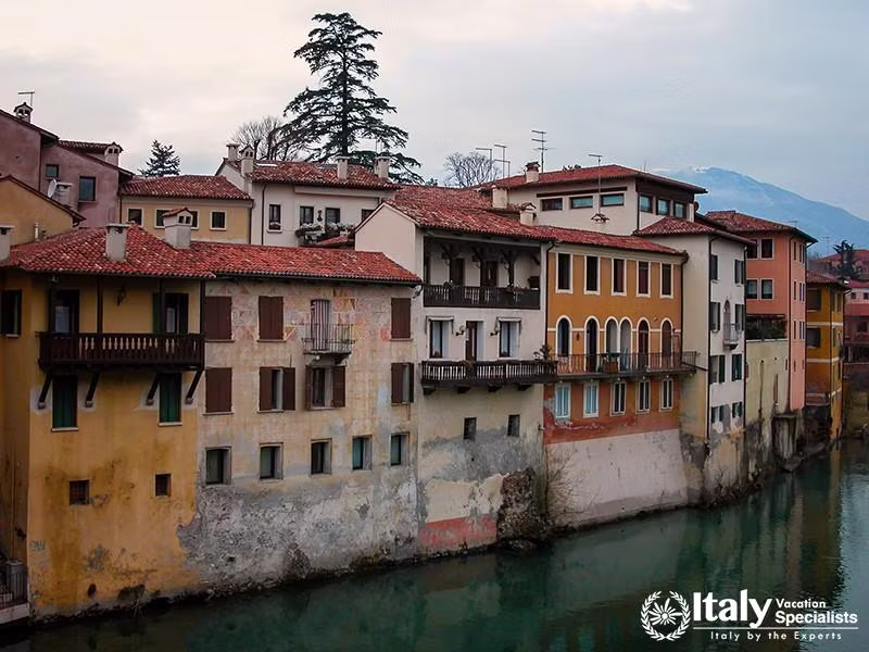 view from the Ponte Vecchio (Old bridge) or Ponte degli Alpini, a covered wooden pontoon bridge loca