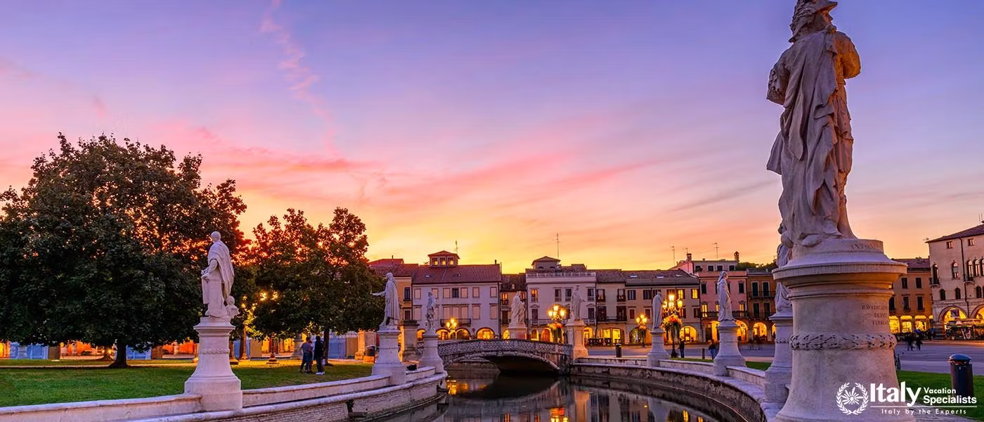 View of the canal with statues on Prato della Valle in Padova (Padua), Veneto, Italy