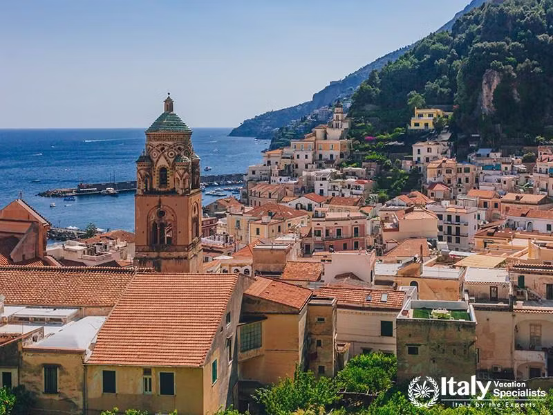 View of the houses of the town of Amalfi, Italy, by mountains and sea
