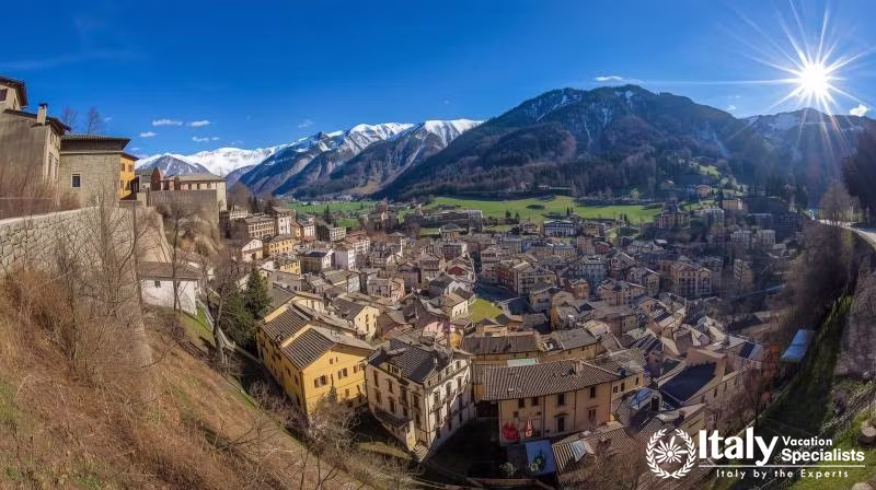 Bormio nestled in the Valtellina Valley and surrounded by the majestic peaks of the Italian Alps