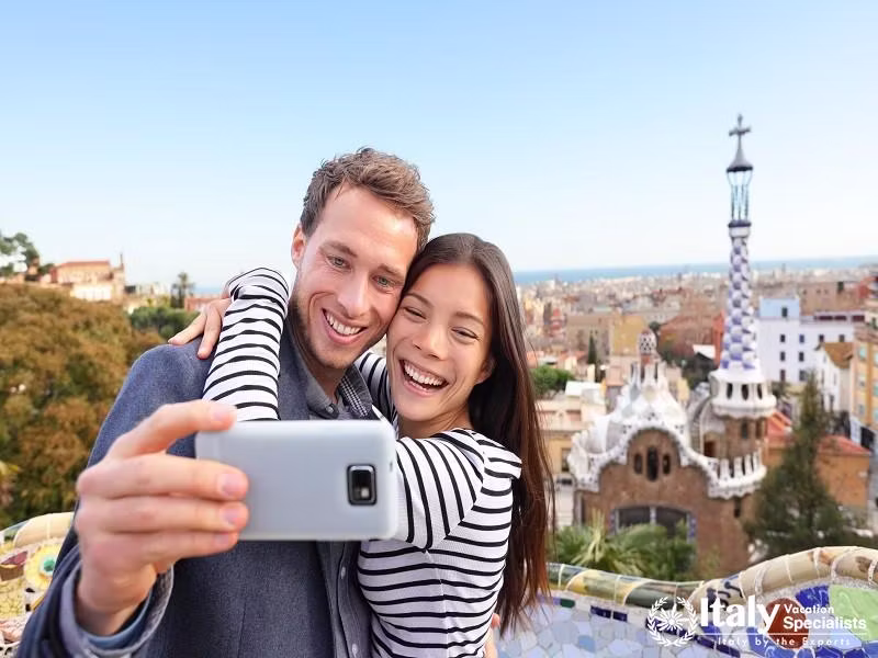Couple Traveling in Park Guell, Barcelona, Spain