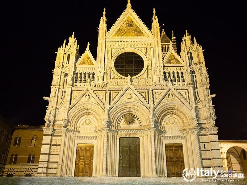 Night view of Siena Cathedral Santa Maria Assunta (Duomo di Siena) in Siena, Tuscany, italy. Italian