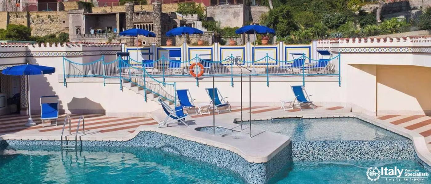 A beautiful outdoor swimming pool area, perfect for relaxation with sun loungers and umbrellas.