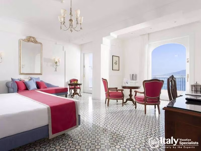 Bright, spacious suite with classic decor and sea-view balcony.