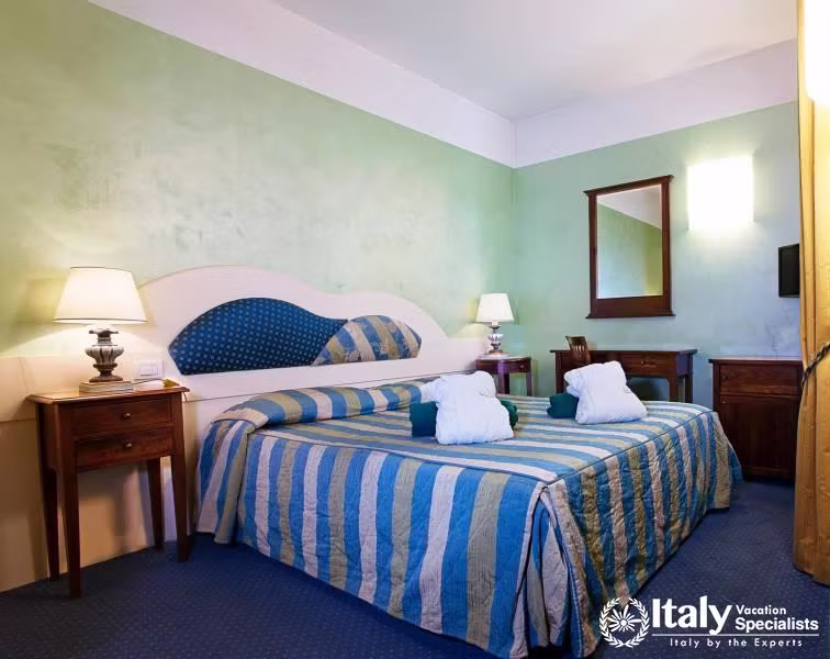 Relaxing bedroom in Grand Hotel Terme Roseo