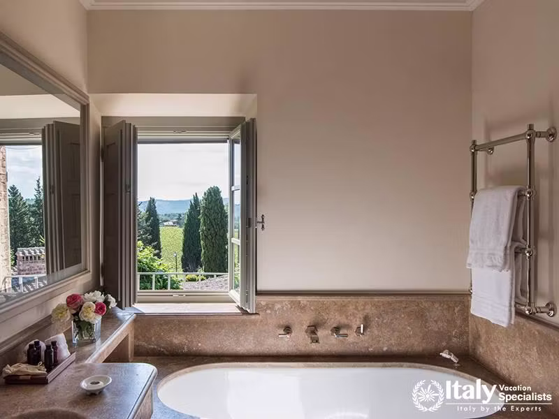 Bathroom with tub in Borgo San Felice Hotel