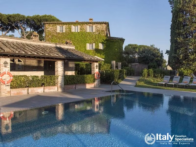 Outdoor swimming pool in Borgo San Felice Hotel