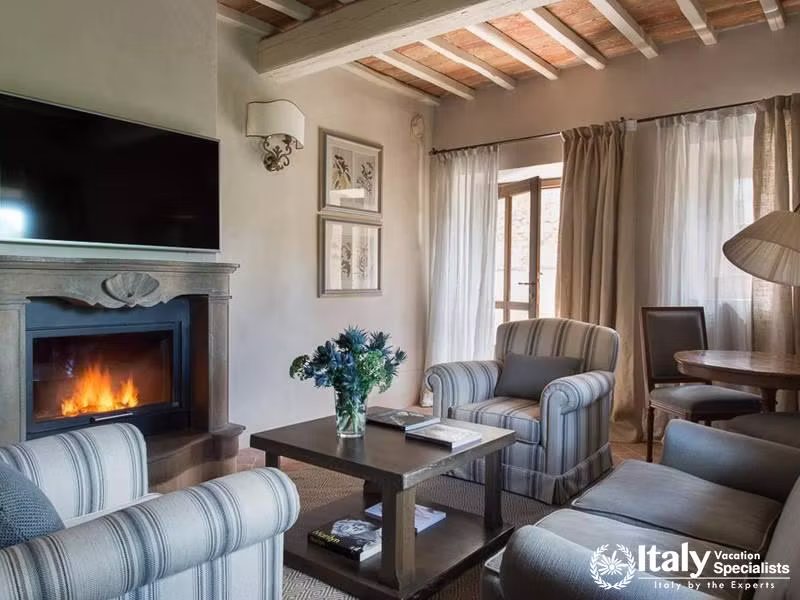 Wonderful sofas and sitting area near fireplace in Relais & Chateaux il Borro