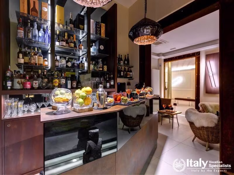 Enjoy a stylishly curated bar offering premium drinks in a chic and cozy atmosphere.