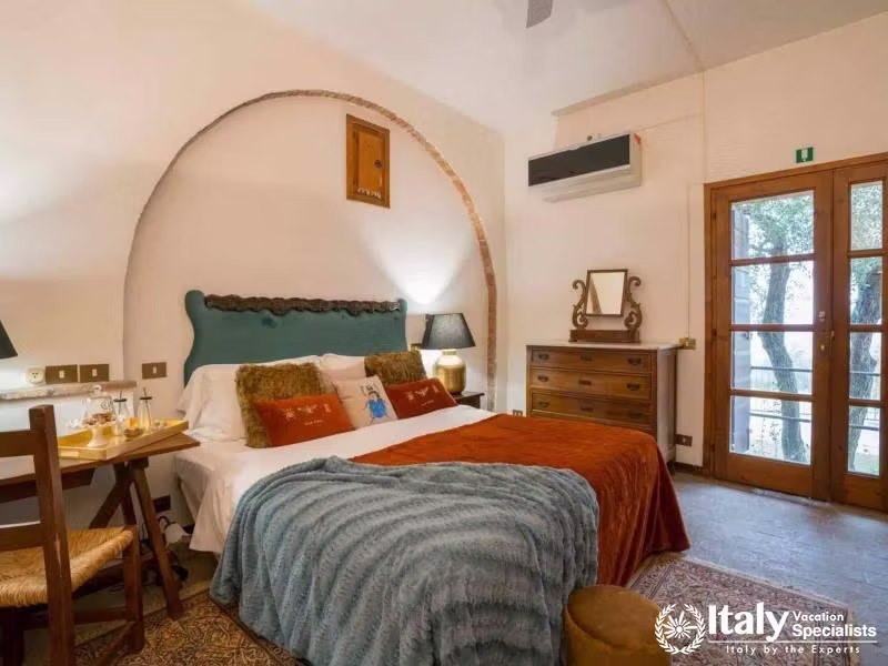Intimate Elegance in Relais La Chiusas Cozy Standard Room