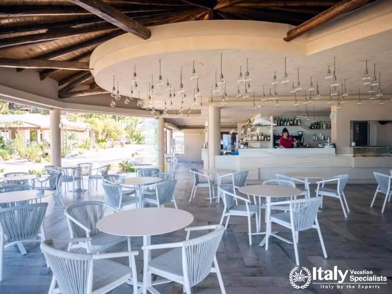 Chic and spacious, the bar area invites socializing at Villaggio Il Gabbiano