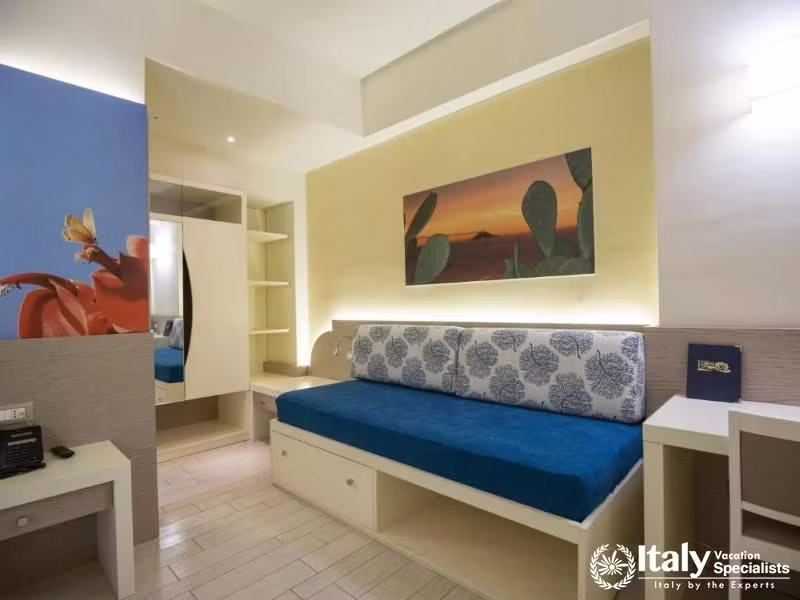 The comfortable daybed adds a touch of convenience to Villaggio Il Gabbianos modern rooms