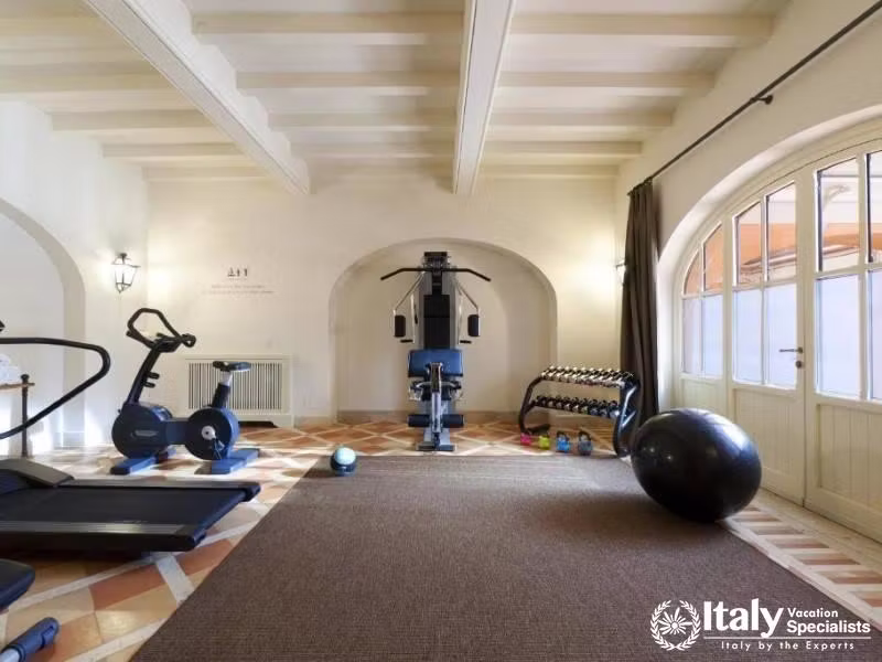 Well-equipped gym in an inviting arched setting at QC Termeroma Spa and Resort