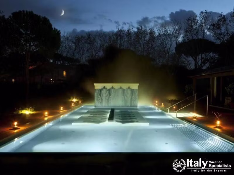 Mystic outdoor thermal pool under a crescent moon at QC Termeroma Spa and Resort