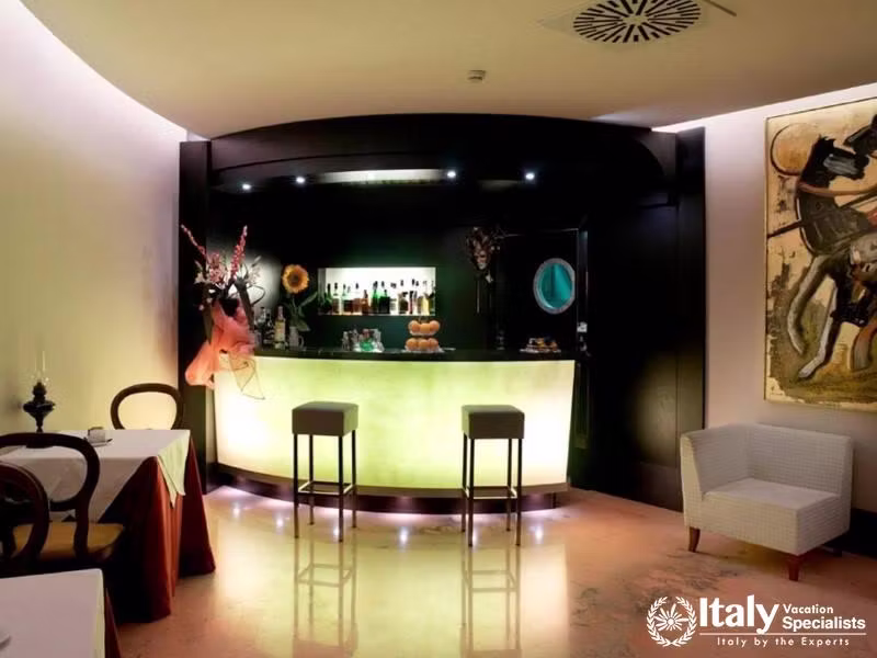 Relax and unwind at our chic and intimate bar, the perfect spot for an evening drink.