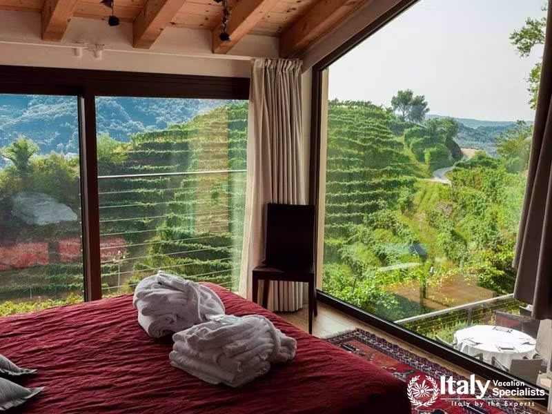 Relaxing Bedroom with Vineyard Views at Agriturismo Due Carpini in Valdobbiadene, Italy