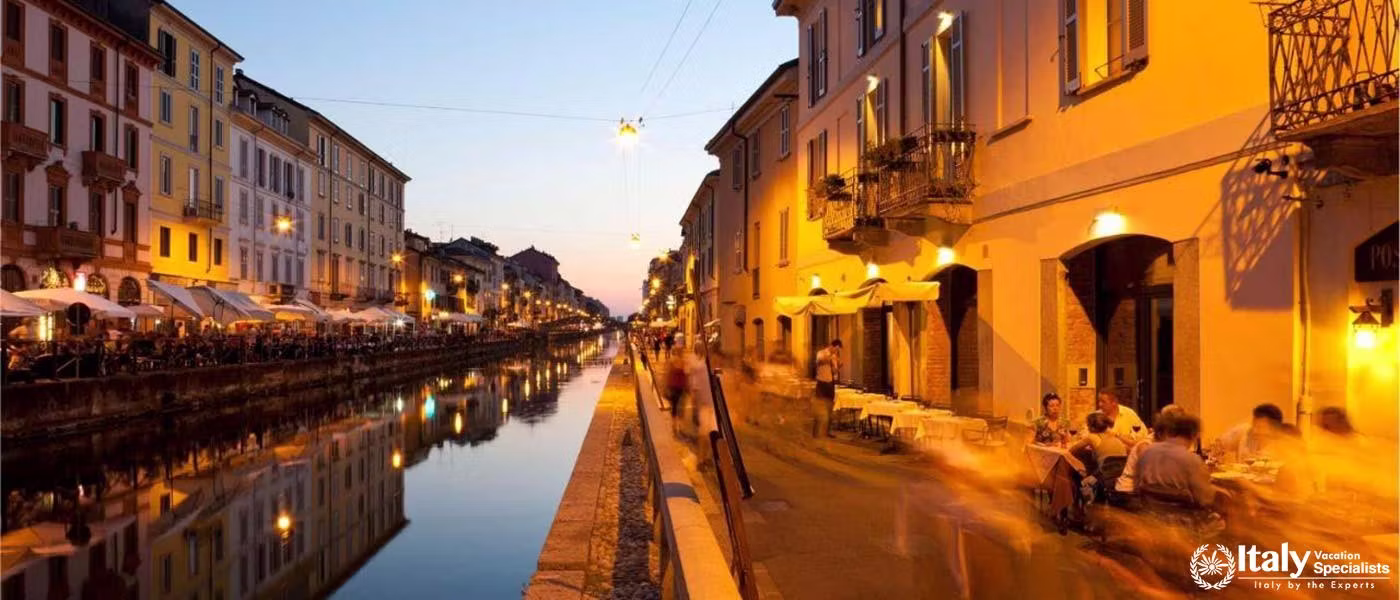 Evening ambiance along the Naviglio Grande near Hotel Maison Borella.