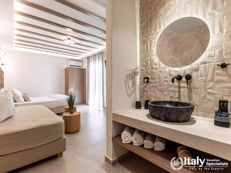 The stylish bathroom setup at Perla Hotel in Naxos, Greece