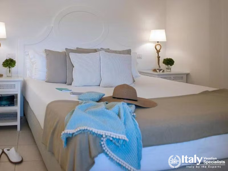 Cozy Bedroom at Hotel Lungarno in Florence, Italy