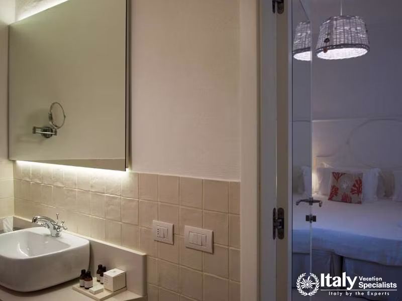 Elegant Bathroom and Bedroom View from Hotel Lungarno in Florence, Italy