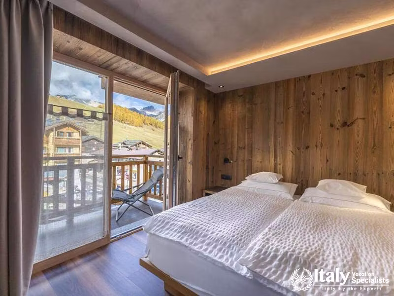 Spacious Room with Comfortable Seating in Bivio Hotel Plaza in Livigno, Italy