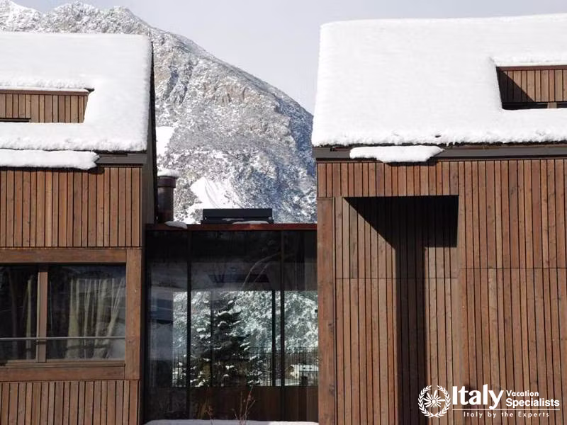 Snow-Capped Roofs and Scenic Mountain View in Eden Hotel