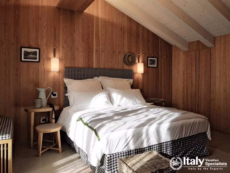 Cozy Bedroom with Wooden Details in Eden Hotel