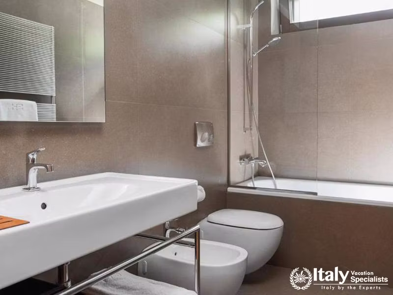 Modern Bathroom Design in Eden Hotel with Clean Lines