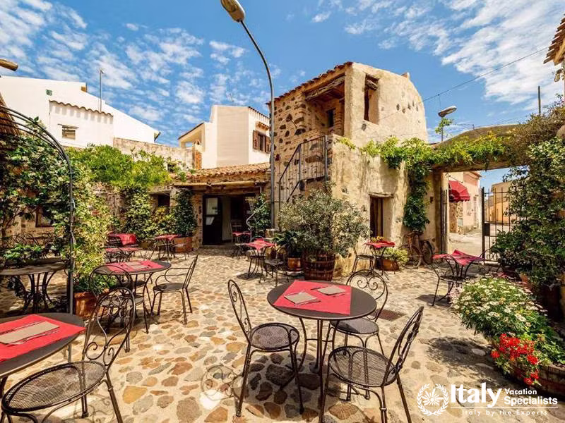 Picturesque Courtyard Dining at Albergo Diffuso Mannois, Orosei