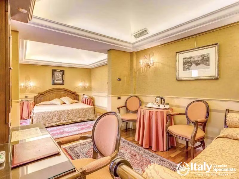 Spacious and refined, the deluxe suite at Hotel Al Codega offers a touch of Venetian luxury.