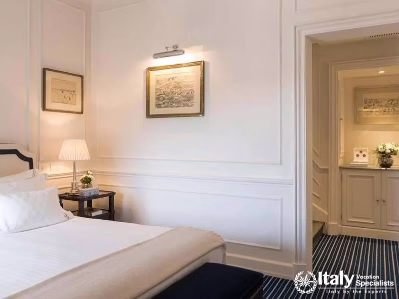 Comfortable Bedroom with Classic Decor at Hotel Lungarno in Florence, Italy