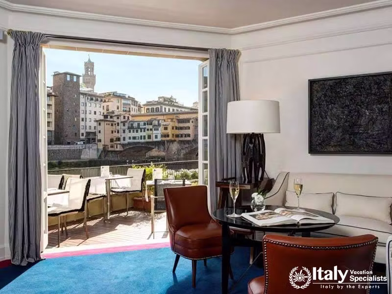 Spacious Living Area with a View at Hotel Lungarno in Florence, Italy