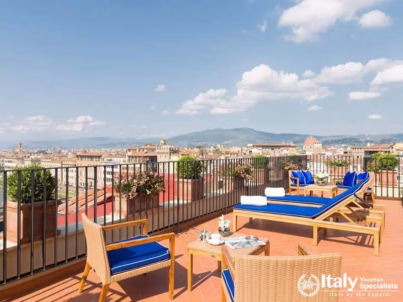 Spacious Rooftop Lounge with Panoramic Views at Hotel Lungarno in Florence, Italy
