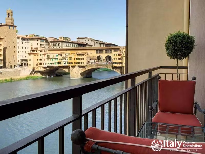 Cozy Balcony with Stunning River View at Hotel Lungarno in Florence, Italy