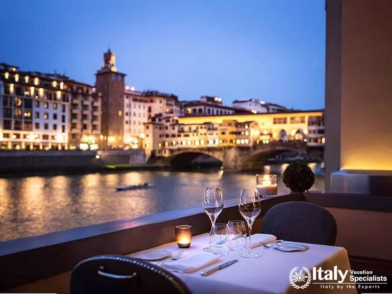 Romantic Candle light dinning area in the balcony at Hotel Lungarno in Florence, Italy