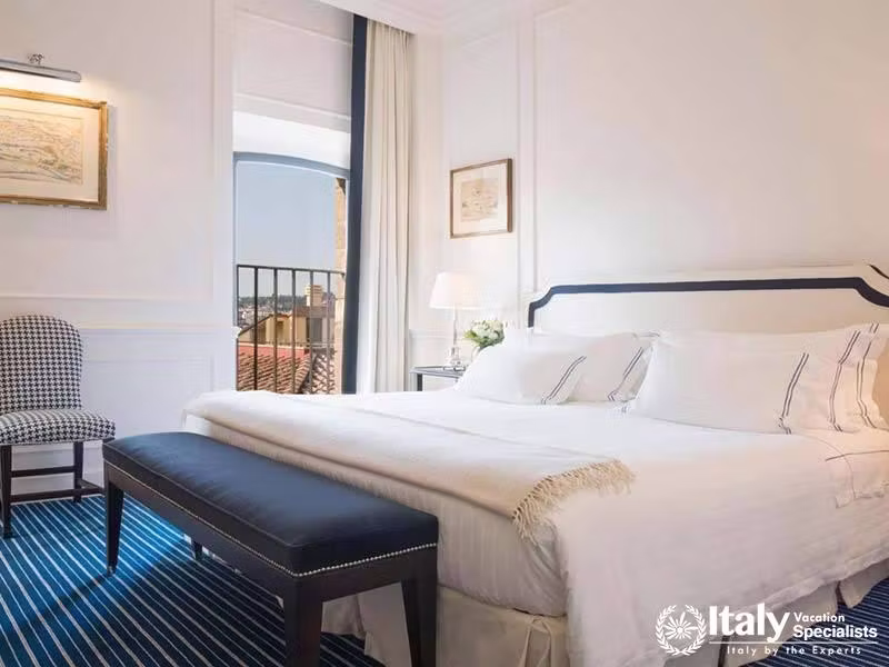 Comfortable and Elegant Bedroom at Hotel Lungarno in Florence, Italy