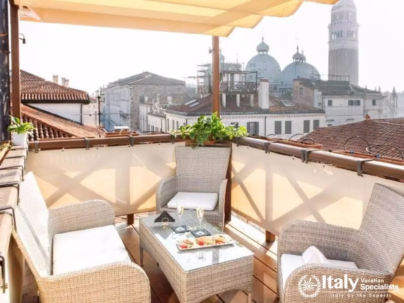 Experience breathtaking rooftop vistas over breakfast at Hotel Colombina.