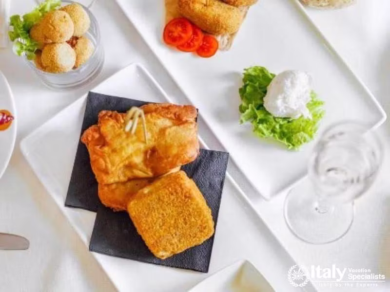 Savor exquisite Venetian cuisine in the refined setting of Hotel Colombina.