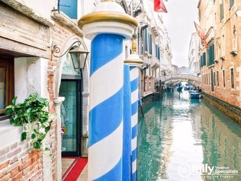 Quintessentially Venetian, the waterway entrance exudes charm at Hotel Colombina.