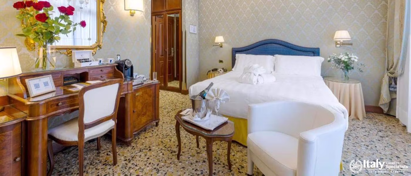 Elegant comfort with a hint of Venetian charm defines the guest rooms at Hotel Colombina.