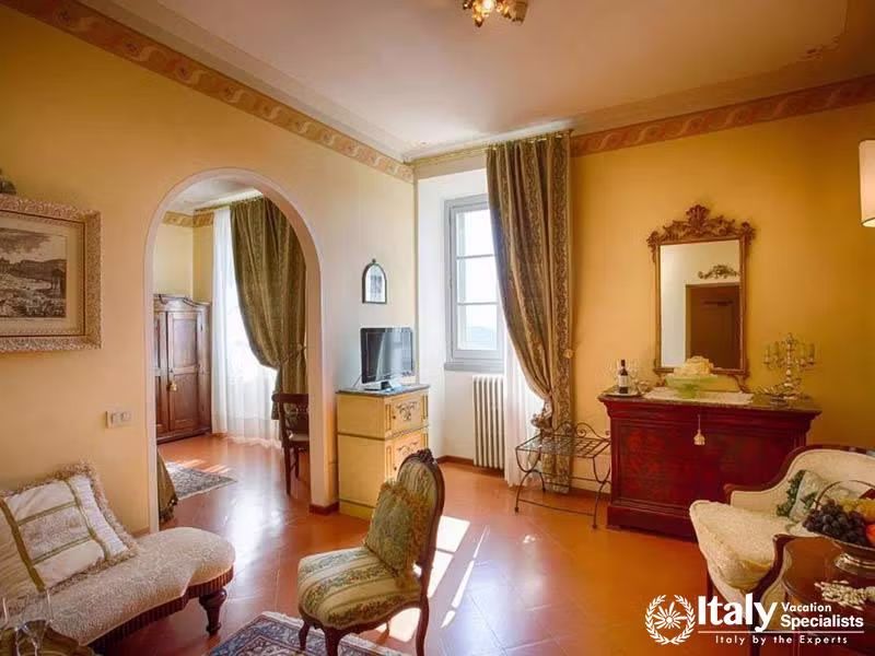 Elegant Sitting Area in a Cozy Suite at Hotel Villa Marsili in Cortona, Italy