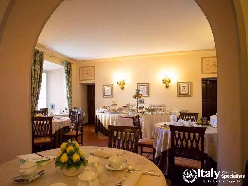 Bright and Charming Breakfast Room at Hotel Villa Marsili in Cortona, Italy