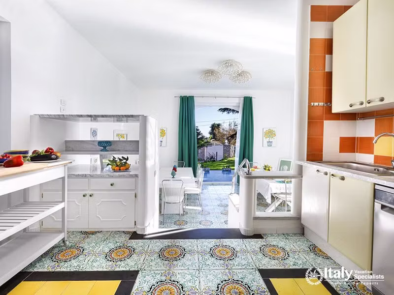 Modern Kitchen with Bright Tiles in Villa del Mar, Marina del Cantone