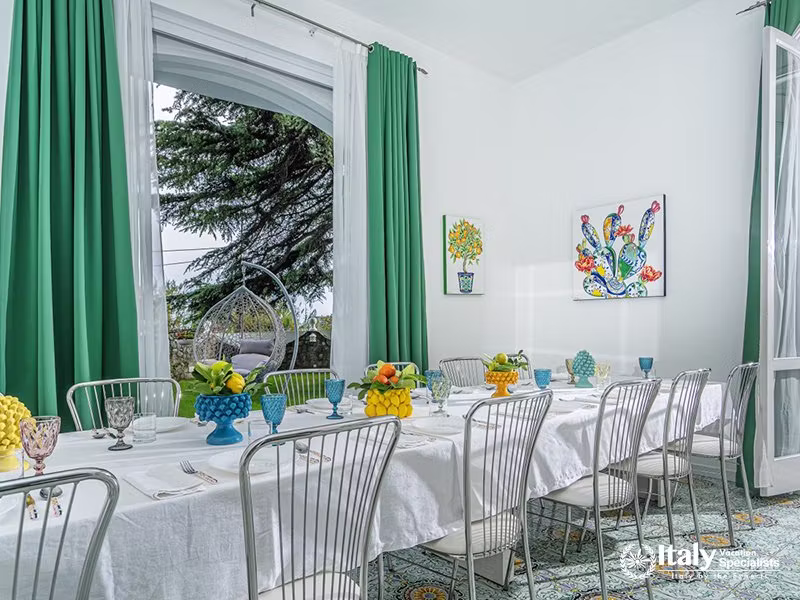Bright Dining Room with Artistic Decor in Villa del Mar, Marina del Cantone