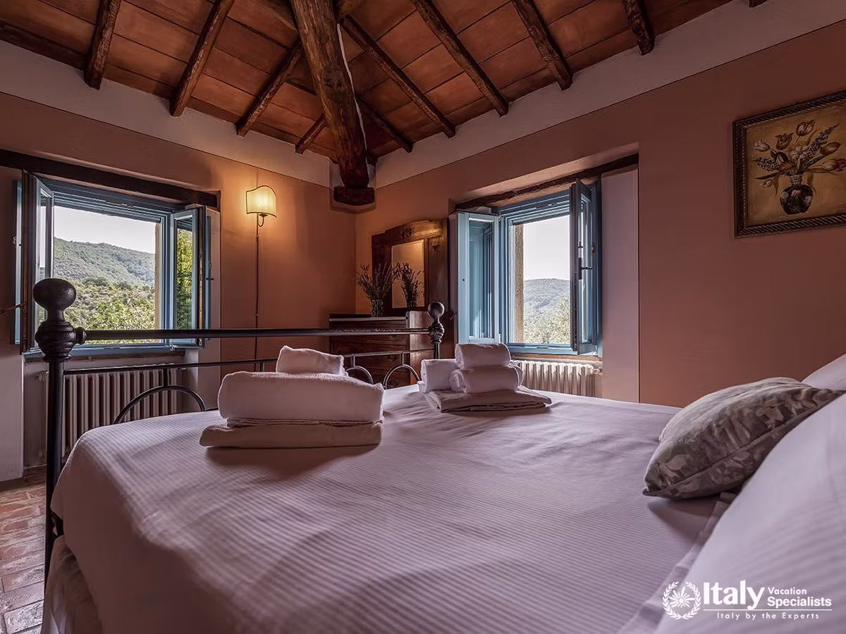 Panoramic Hill Views from a Bedroom at Villa San Martino