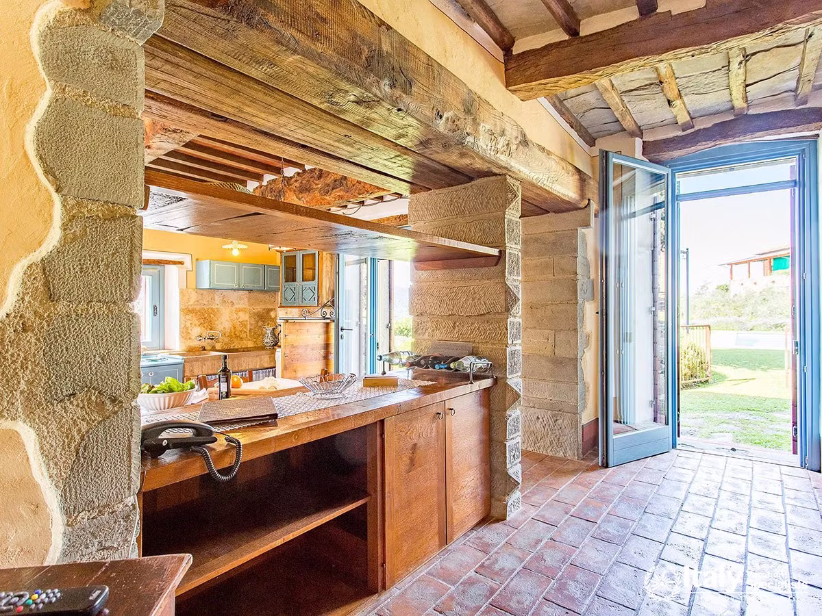 Bright Country Kitchen with Garden Access at Villa San Martino